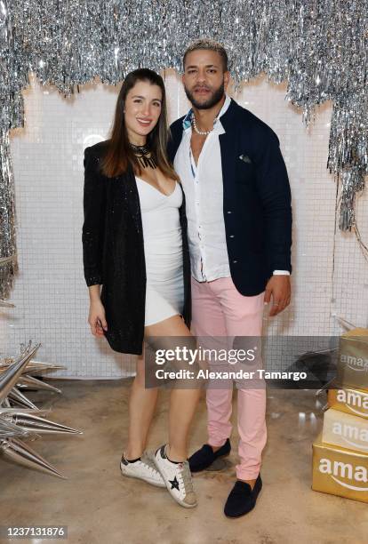 Natasha Dominguez and Yasmany Rodriguez are seen during a holiday dinner on December 9, 2021 in Miami, Florida.