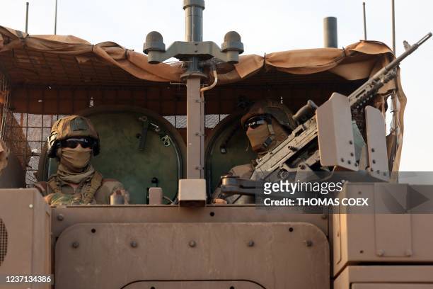 French soldiers patrol the streets of Gao on December 4, 2021. - France's anti-jihadist military force in the Sahel region, which today involves over...