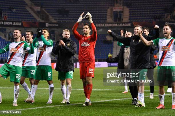 Rapid Wien's players celebrate at the end of the UEFA Europa League Group H football match between KRC Genk and SK Rapid Wien, at Cristal Arena...