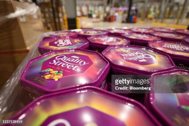 Pallet of Quality Street chocolates, manufactured by Nestle SA, at a distribution warehouse operated by GXO Logistics Inc. Near Derby, U.K., on...