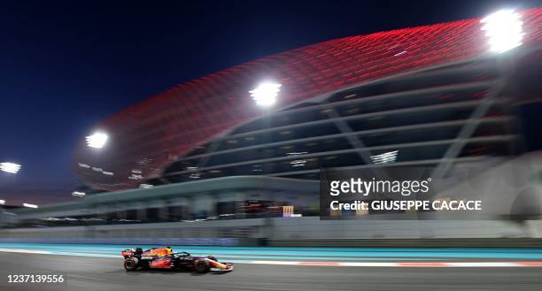 Red Bull's Dutch driver Max Verstappen drives at the Yas Marina Circuit during the second free practice session of the Abu Dhabi Formula One Grand...