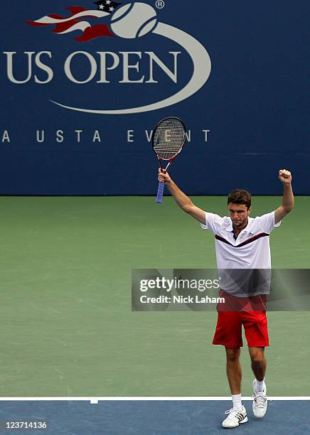 Gilles Simon of France celebrates after defeating Juan Martin Del Potro of Argentina during Day Seven of the 2011 US Open at the USTA Billie Jean...