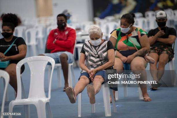 Patients await medical treatment at the Health Care Center specialized in Flu and COVID-19 located at the Rio 2016's Olympic Park in Barra da Tijuca...