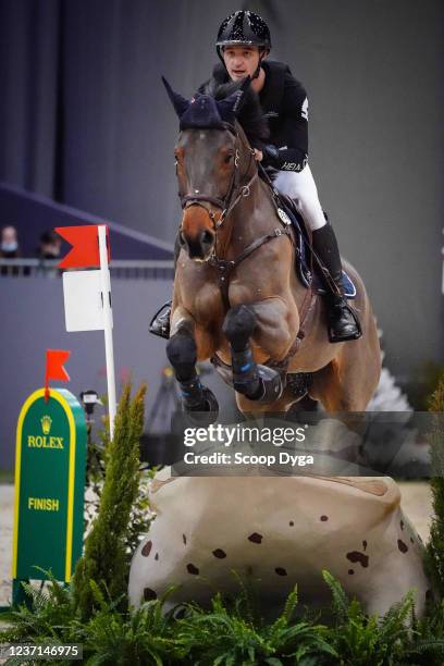 Robin Godel of Switzerland riding Grandeur de Lully CH during the CHI de Geneva - Rolex Grand Slam of Show Jumping on December 10, 2021 in Geneva,...