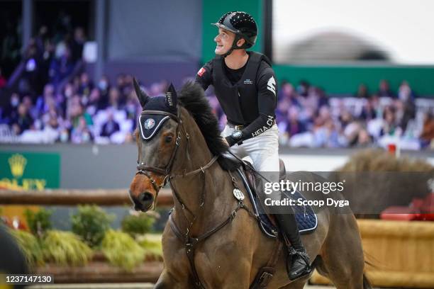 Robin Godel of Switzerland riding Grandeur de Lully CH during the CHI de Geneva - Rolex Grand Slam of Show Jumping on December 10, 2021 in Geneva,...