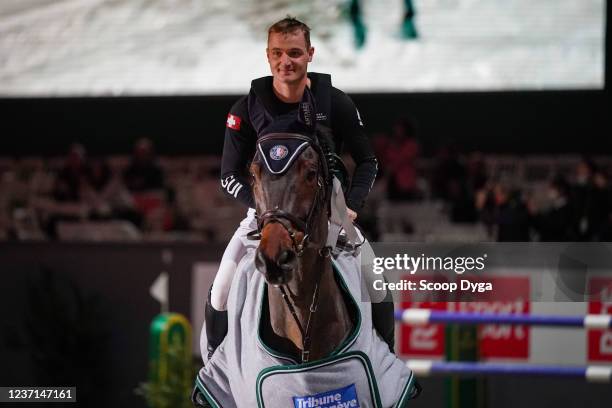 Robin Godel of Switzerland riding Grandeur de Lully CH during the CHI de Geneva - Rolex Grand Slam of Show Jumping on December 10, 2021 in Geneva,...