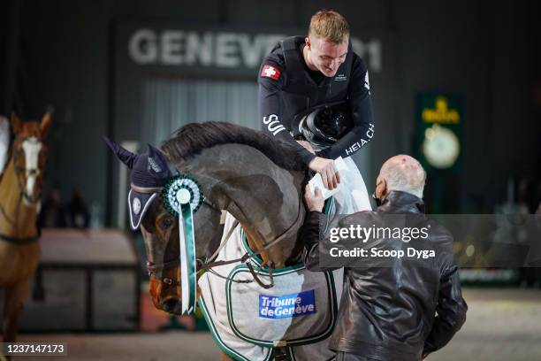 Robin Godel of Switzerland riding Grandeur de Lully CH during the CHI de Geneva - Rolex Grand Slam of Show Jumping on December 10, 2021 in Geneva,...