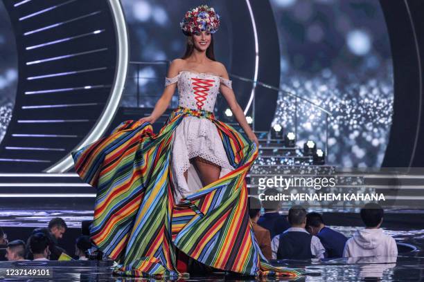 Miss Poland, Agata Wdowiak, appears on stage during the national costume presentation of the 70th Miss Universe beauty pageant in Israel's southern...