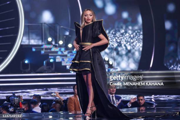 Miss Kosovo, Tuti Sejdiu, appears on stage during the national costume presentation of the 70th Miss Universe beauty pageant in Israel's southern Red...