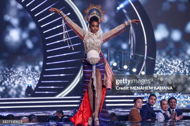 Miss Haiti, Pascale Belony, appears on stage during the national costume presentation of the 70th Miss Universe beauty pageant in Israel's southern...