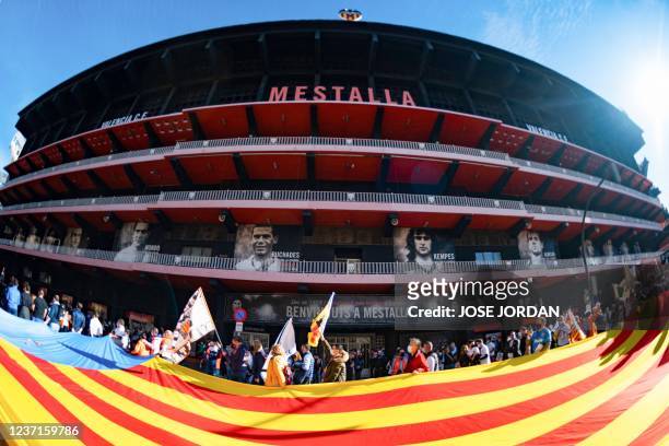 Valencia football club supporters take part in a protest against Singaporean business magnate and owner of the club Peter Lim outside the Mestalla...