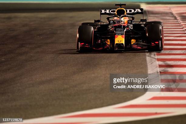 Red Bull's Dutch driver Max Verstappen drives at the Yas Marina Circuit during the qualifying session of the Abu Dhabi Formula One Grand Prix on...