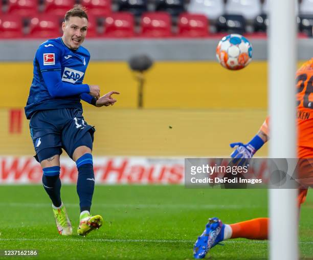 David Raum of TSG 1899 Hoffenheim scores his team's first goal during the Bundesliga match between Sport-Club Freiburg and TSG Hoffenheim at...