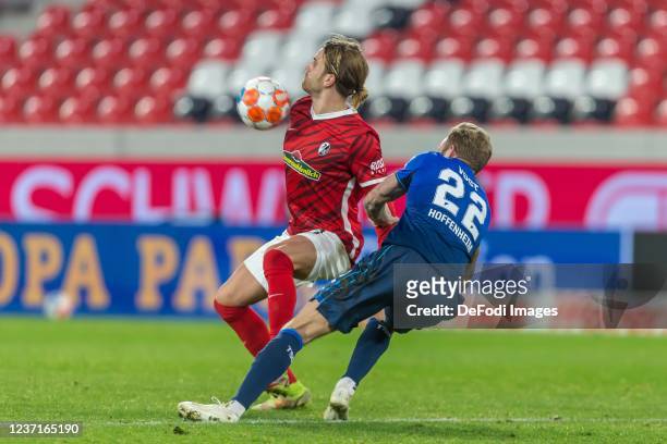 Lucas Hoeler of SC Freiburg and Roland Sallai of SC Freiburg battle for the ball during the Bundesliga match between Sport-Club Freiburg and TSG...