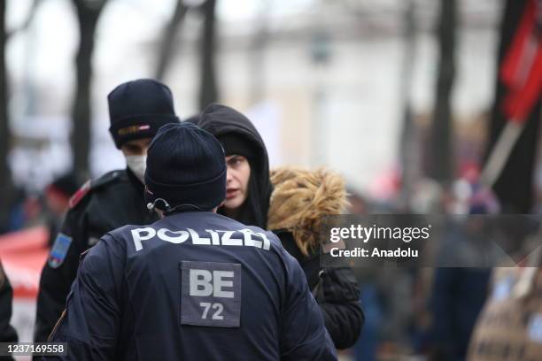 Police officers intervene in people gathering at Heldenpltaz to protest against Covid-19 measures and mandatory COVID-19 vaccine in Vienna, Austria...