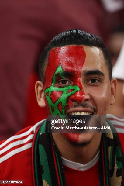 Fan of Morocco with face paint during the FIFA Arab Cup Qatar 2021 Quarter-Final match between Morocco and Algeria at Al Thumana Stadium on December...