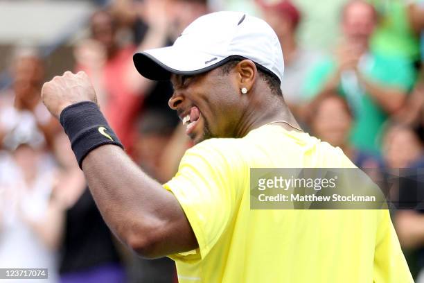 Donald Young of the United States celebrates after defeating Juan Ignacio Chela of Argentina during Day Seven of the 2011 US Open at the USTA Billie...