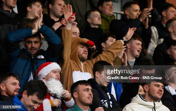 Fans dressed as reindeer and santa during a Cinch Premiership match between Ross County and Dundee at Victoria Park , on December 11 in Dingwall,...