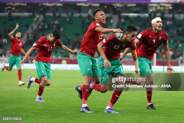 Badr Benoun of Morocco celebrates after scoring a goal to make it 2-2 during the FIFA Arab Cup Qatar 2021 Quarter-Final match between Morocco and...