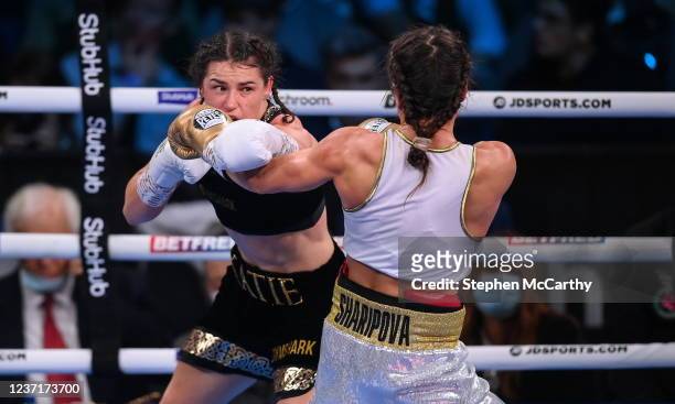 Liverpool , United Kingdom - 11 December 2021; Katie Taylor, left, and Firuza Sharipova during their Undisputed Lightweight Championship bout at M&S...