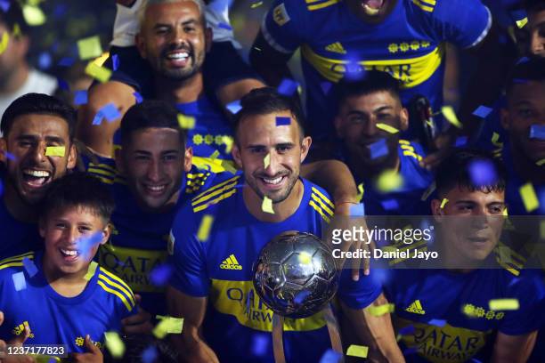 Players of Boca Juniors celebrate after a match between Boca Juniors and Central Cordoba as part of Torneo Liga Profesional 2021 at Estadio Alberto...