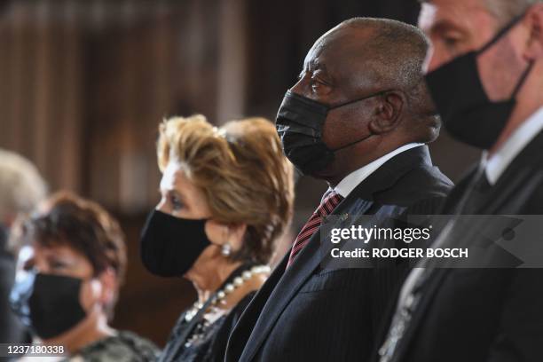Elita Georgiades , wife of former South African President FW de Klerk, and South African President Cyril Ramaphosa , look on during de Klerk's state...