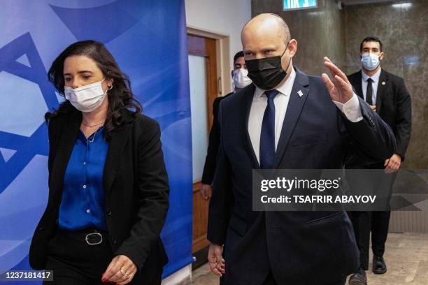 Israeli Prime Minister Naftali Bennett , and Interior Minister Ayelet Shaked , arrive for the weekly cabinet meeting in Jerusalem, on December 12,...