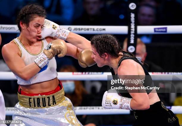 Liverpool , United Kingdom - 11 December 2021; Katie Taylor, right, and Firuza Sharipova during their Undisputed Lightweight Championship bout at M&S...