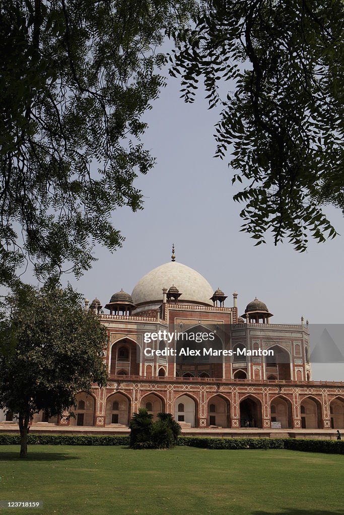 Humayun's Tomb with leaves in the foreground. New Delhi, India