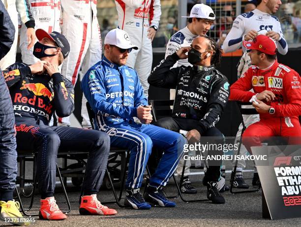 Red Bull's Dutch driver Max Verstappen, Mercedes' Finnish driver Valtteri Bottas, Mercedes' British driver Lewis Hamilton and Ferrari's Monegasque...