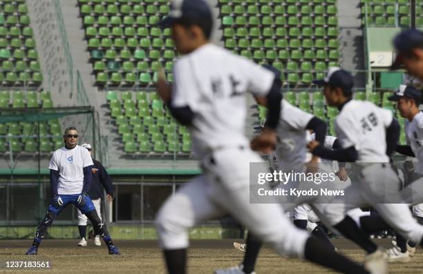 Former Seattle Mariners outfielder Ichiro Suzuki coaches Takamatsu Shogyo high school baseball players as a temporary instructor on Dec. 12 in the...