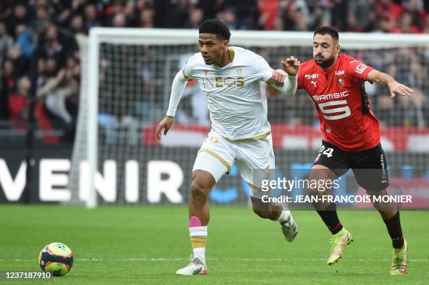 Nice's Algerian midfielder Hicham Boudaoui fights for the ball with Rennes' French forward Gaetan Laborde during the French L1 football match between...