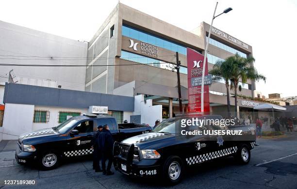 Municipal police and journalists surround the Country 2000 Hospital where Mexican singer Vicente Fernandez died early in the morning in Guadalajara,...