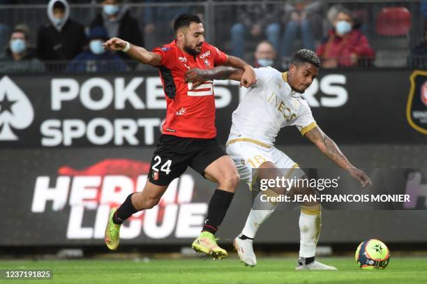 Rennes' French forward Gaetan Laborde fights for the ball with Nice's French midfielder Mario Lemina during the French L1 football match between...