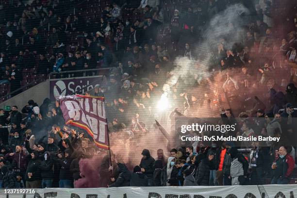 Servette FC fans celebrate a goal during the Swiss Super League match between Servette FC and FC Basel at Stade de Geneve on December 12, 2021 in...