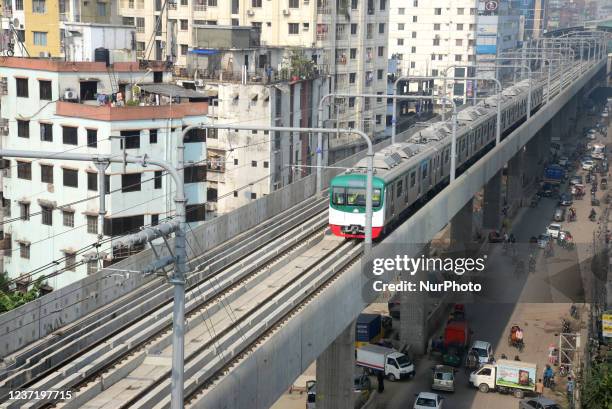 First ever metro rail train runs during its formal trial from Uttaras Diabari to Agargoan in Dhaka, Bangladesh, December 12, 2021. According the...