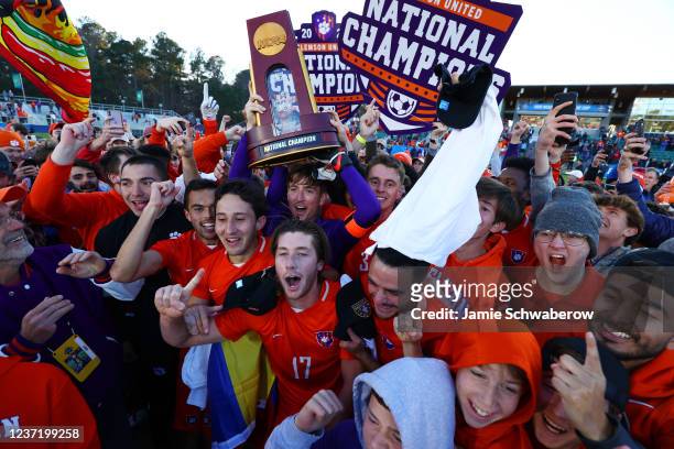 The Clemson Tigers celebration their victory over the Washington Huskies during the Division I Mens Soccer Championship held at Sahlens Stadium at...