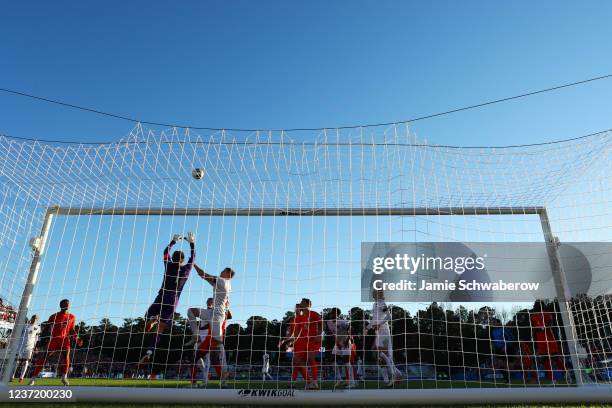 George Marks of the Clemson Tigers protects the goal against the Washington Huskies during the Division I Men's Soccer Championship at Sahlens...