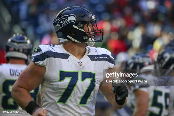 Seattle Seahawks center Ethan Pocic jogs off the field during the game between the Houston Texans and Seattle Seahawks on December 12, 2021 at NRG...