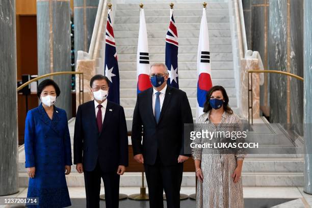 Australian Prime Minister Scott Morrison with first lady Jenny Morrison pose for photographs with South Korean President Moon Jae-in and first lady...