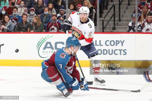 Devon Toews of the Colorado Avalanche blocks a shot by Sam Bennett of the Florida Panthers at Ball Arena on December 12, 2021 in Denver, Colorado.