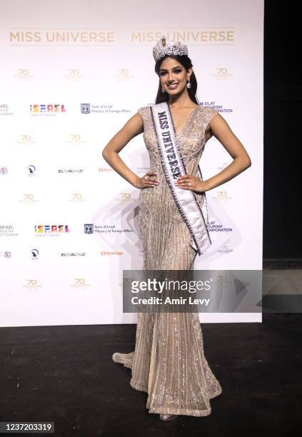 The new Miss Univerese Harnaaz Sandhu from India poses for photographers during a press conference after the 70th Miss Universe Competition on...