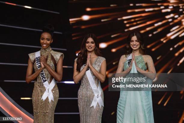 The final three Miss Universe contestants Miss South Africa, Lalela Mswane; Miss India, Harnaaz Sandhu; and Miss Paraguay, Nadia Ferreira pose on...