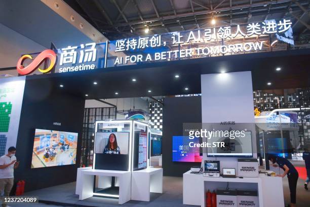 This photo taken on July 7, 2021 shows a booth of China's Chinese artificial intelligence company SenseTime at 2021 World Artificial Intelligence...