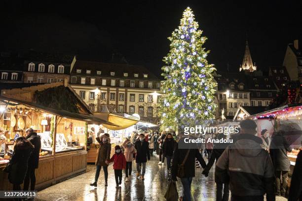 Christmas tree is illuminated at Strasbourg christmas market on December 11, 2021 in Strasbourg, France. Strasbourg christmas market tightens its...