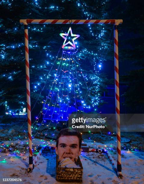 Christmas decorations with an image of Justin Bieber in front of the house in Candy Cane Lane, a residential area of Edmonton. Sunday, December 12 in...