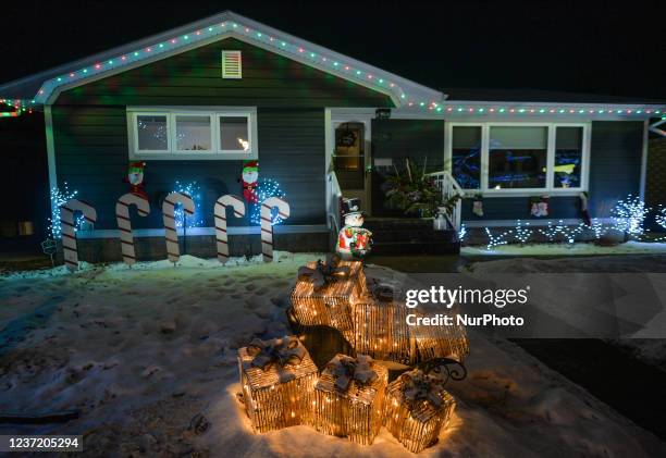 House covered in Christmas lights and decorations in Candy Cane Lane, a residential area of Edmonton. Sunday, December 12 in Edmonton, Alberta,...