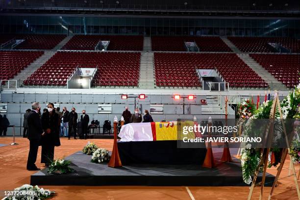 President of the Real Madrid Florentino Perez and Manuel Santana's widow Claudia Ines Rodriguez pay tribute to the coffin of former Spanish tennis...