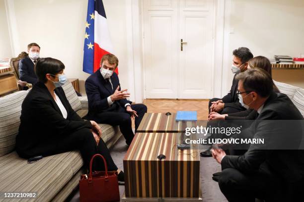 French President Emmanuel Macron speaks with the representatives of Hungarian opposition parties, Peter Marki-Zay , leader of Everybody's Hungary...