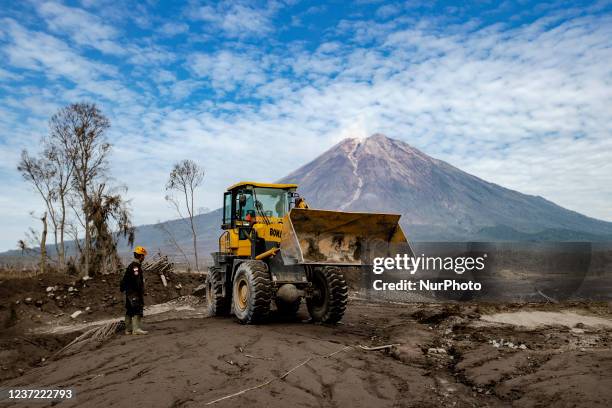 The Mount Semeru erupted and killed at least 48 people and injured dozens after it unleashed lava and thick columns of hot ash that buried a number...